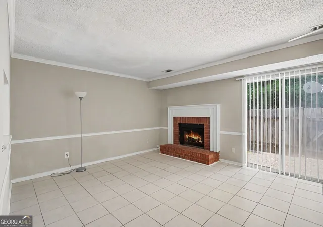 Photo 2 of Townhouse for sale at 8547 Jamestown Wy, Jonesboro, GA 30238 | MLS# 10830046 | Listing updated on 2026-09-07