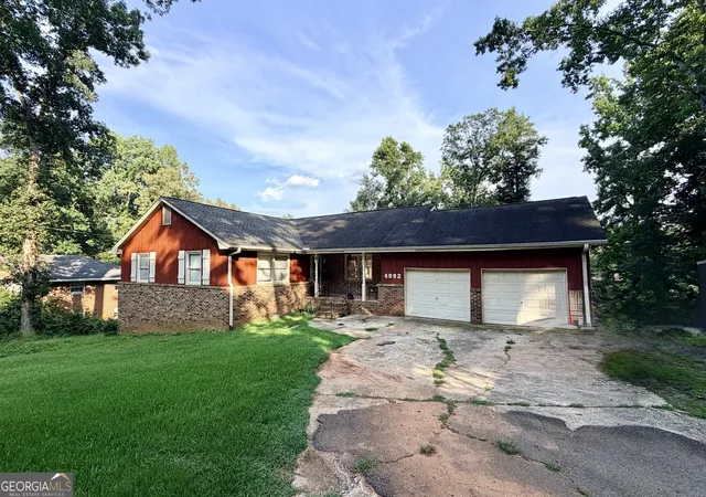 1st image of 4992 Green Oak Dr Sw, Lilburn, GA 30047 | MLS# 10816060