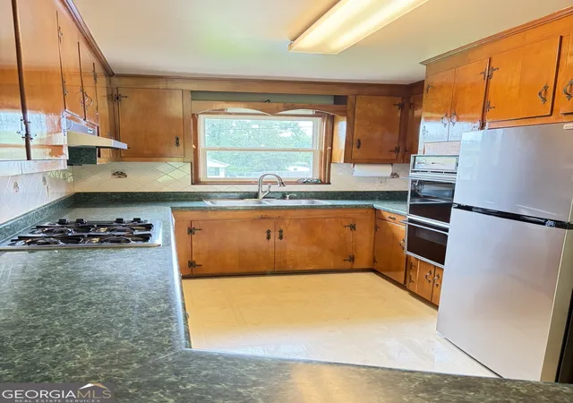 Photo 3 of Single family home for sale at 52 Lyons Dr Nw, Rome, GA 30165 | MLS# 10772933 | Listing updated on 2026-09-12
