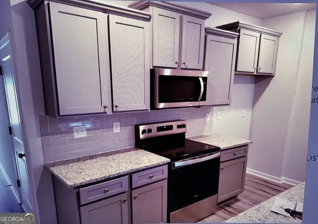 Photo 4 of Townhouse for sale at 11554 Chatham Dr, Hampton, GA 30228 | MLS# 10827077 | Listing updated on 2026-08-30