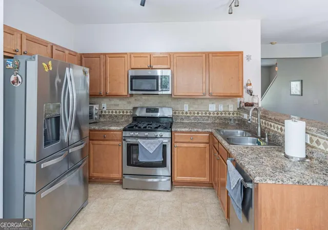 Photo 3 of Townhouse for sale at 1216 Park Pass Wy, Suwanee, GA 30024 | MLS# 10775470 | Listing updated on 2026-09-20