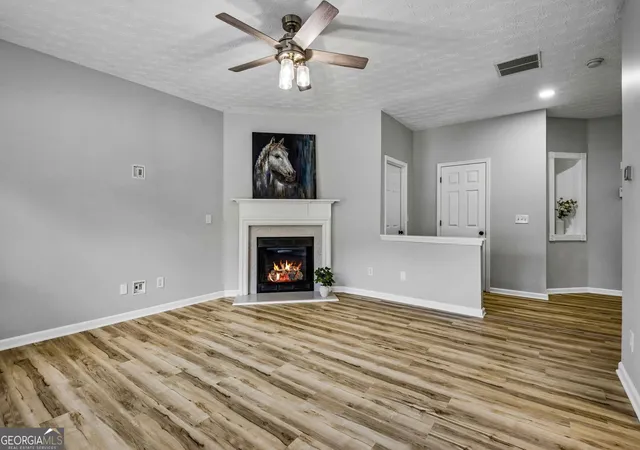 Photo 3 of Single family home for sale at 313 Woodland Pass, Canton, GA 30114 | MLS# 10768897 | Listing updated on 2026-09-18