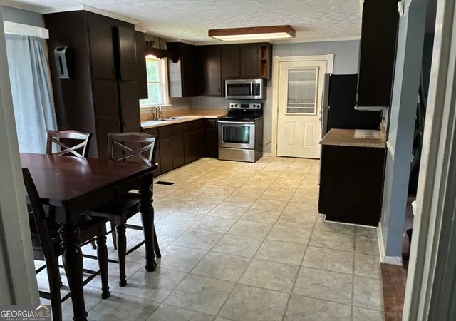 Photo 3 of Single family home for sale at 4148 Highway 162 S, Covington, GA 30016 | MLS# 10795826 | Listing updated on 2026-09-04