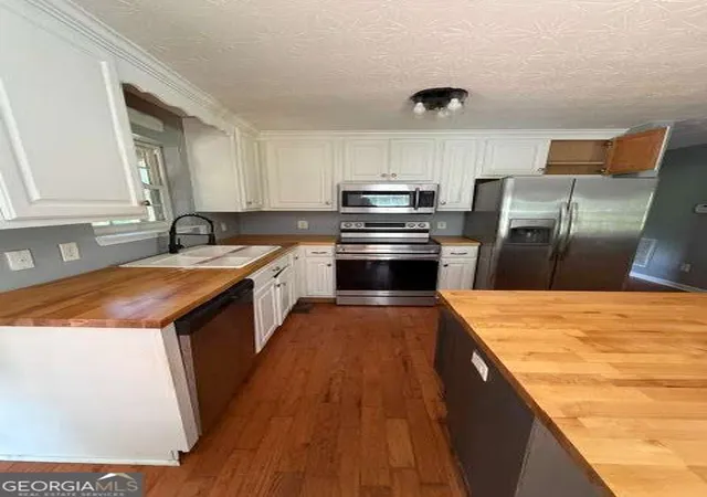 Photo 2 of Single family home for sale at 905 Hancock Mountain Trl, Waleska, GA 30183 | MLS# 10834910 | Listing updated on 2026-09-11