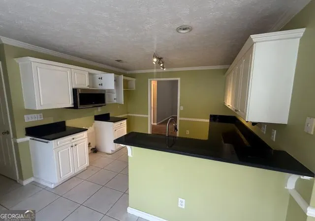 3rd image of 3450 Weeping Willow Ln, Loganville, GA 30052 | MLS# 10816397