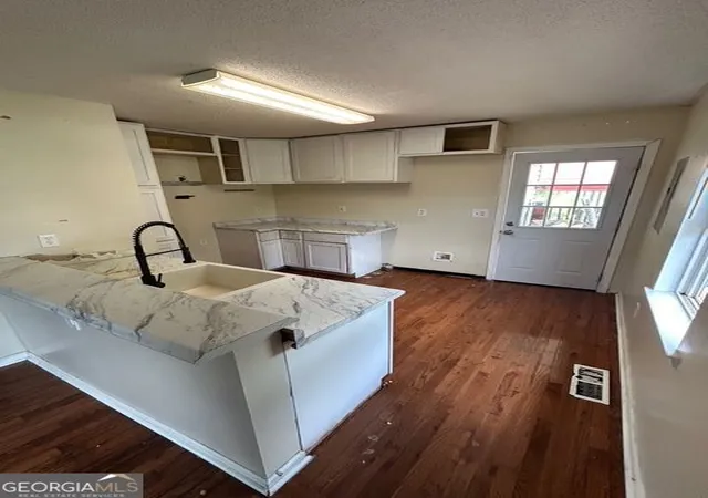 Photo 2 of Single family home for sale at 213 Hardy Avenue Avenue Sw, Rome, GA 30161 | MLS# 10810746 | Listing updated on 2026-08-24