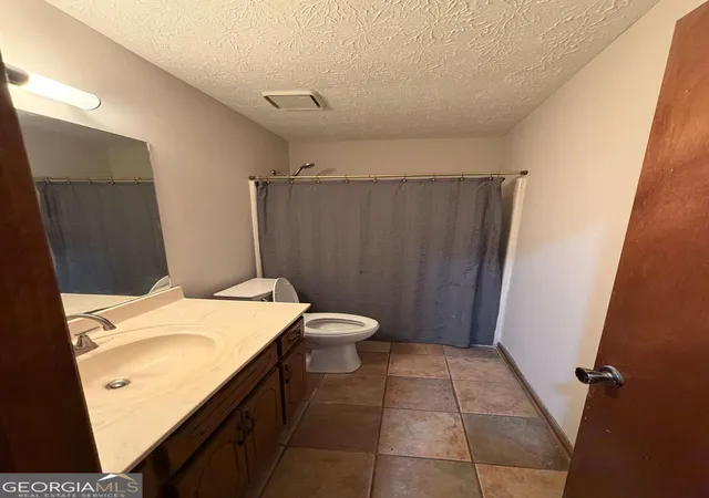 Photo 3 of Single family home for sale at 1094 Crystal Lake Rd, Atlanta, GA 30349 | MLS# 10817745 | Listing updated on 2026-08-17