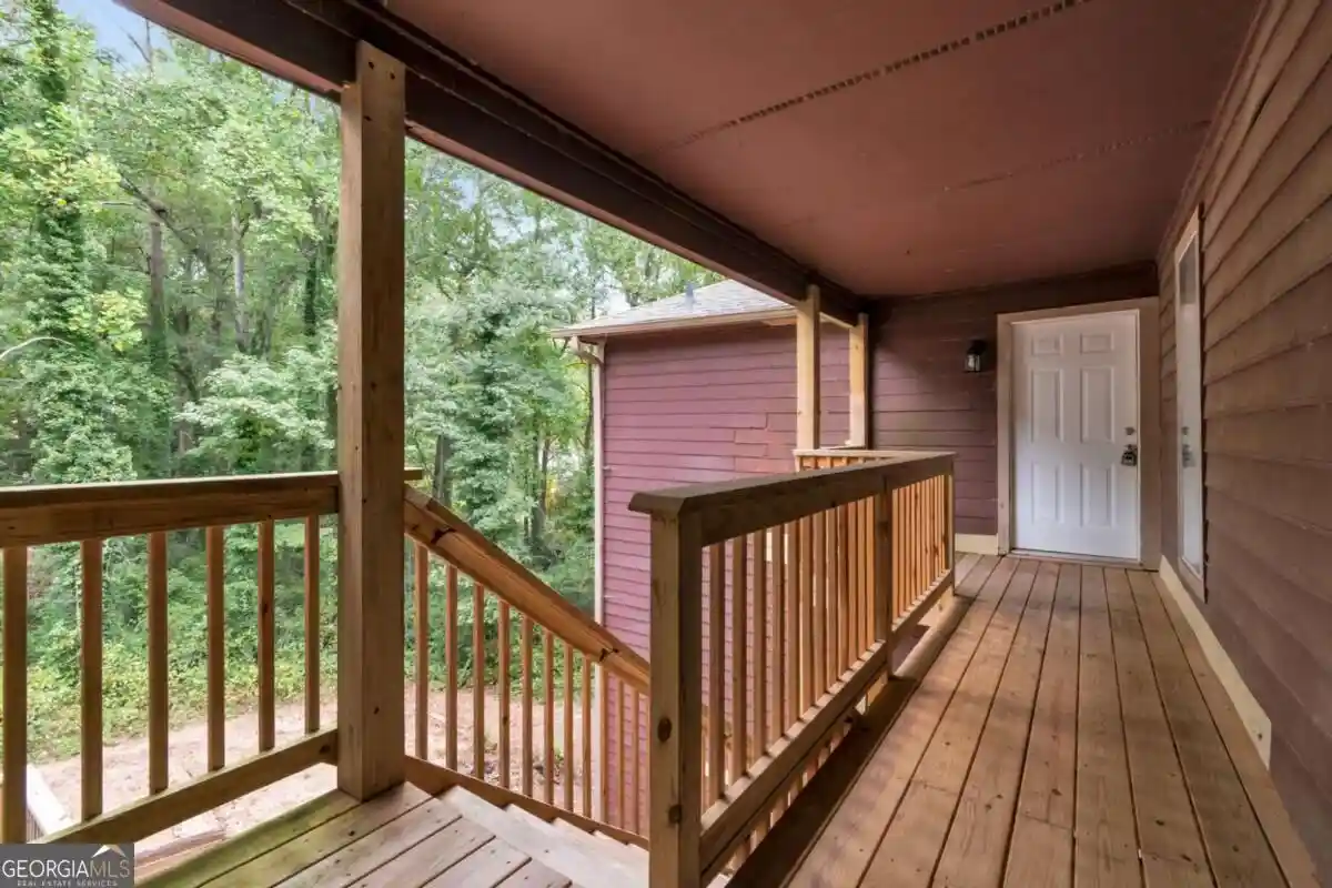 Listing Photo 1 - Condo for sale in 5557 Mountain Springs Cir located at 5557 Mountain Springs Cir, Stone Mountain, GA 30088 - Unit 5557 Mountain Springs Cir
