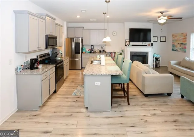 Photo 3 of Townhouse for sale at 7488 Knoll Holw Rd, Lithonia, GA 30058 | MLS# 10682701 | Listing updated on 2026-09-08