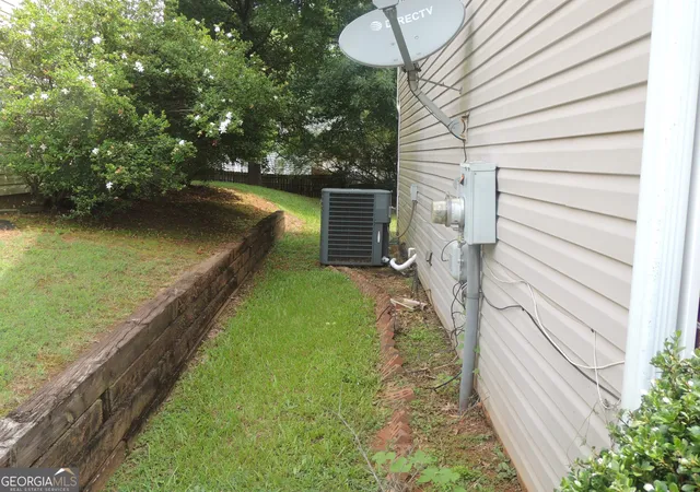 Photo 2 of Single family home for sale at 6574 Lake Ml Tr, Lithonia, GA 30038 | MLS# 10808577 | Listing updated on 2026-09-14
