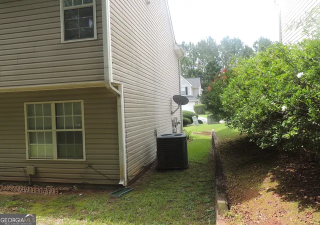 Photo 3 of Single family home for sale at 6574 Lake Ml Tr, Lithonia, GA 30038 | MLS# 10808577 | Listing updated on 2026-09-14