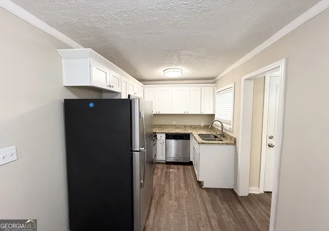 Photo 4 of Single family home for sale at 939 N Eugenia Pl Nw, Atlanta, GA 30318 | MLS# 10830245 | Listing updated on 2026-10-03