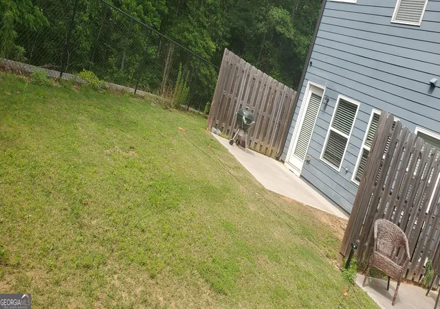 Photo 3 of Townhouse for sale at 4915 Lower Elm St, Atlanta, GA 30349 | MLS# 10571530 | Listing updated on 2025-08-11