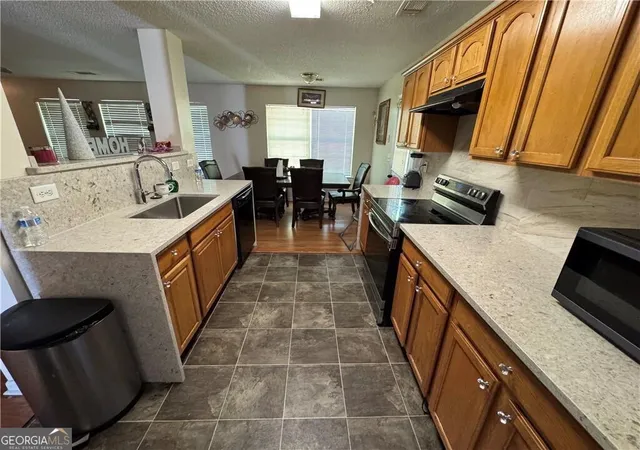 Photo 3 of Single family home for sale at 6231 Hickory Ln Cir, Union City, GA 30291 | MLS# 10741764 | Listing updated on 2026-05-11