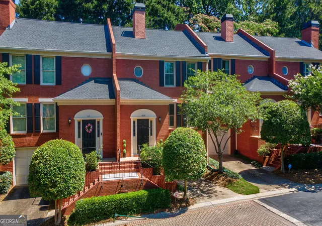 Photo 1 of Townhouse for sale at 1002 Defoors Mill Dr Nw, Atlanta, GA 30318 | MLS# 10781100 | Listing updated on 2026-10-08