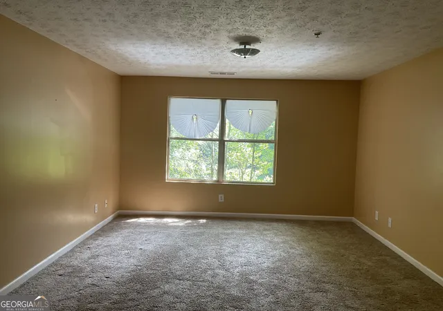 Photo 3 of Condo for sale at 1203 Par Three Wy, Lithonia, GA 30038 | MLS# 10831159 | Listing updated on 2026-09-25