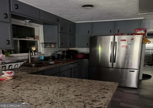 Photo 3 of Single family home for sale at 311 Wyldewood Dr, Mcdonough, GA 30253 | MLS# 10822678 | Listing updated on 2026-09-12
