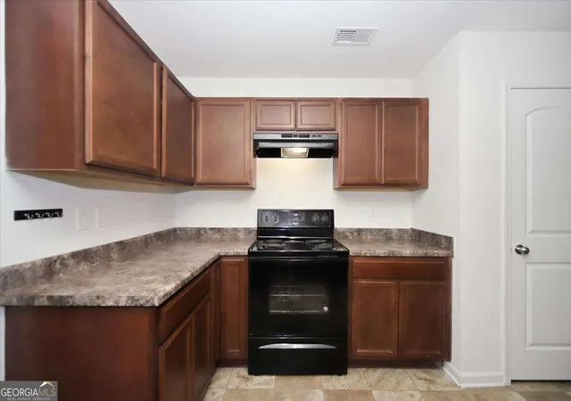 Photo 3 of Townhouse for sale at 2543 Piering Dr, Lithonia, GA 30038 | MLS# 10817734 | Listing updated on 2026-09-25