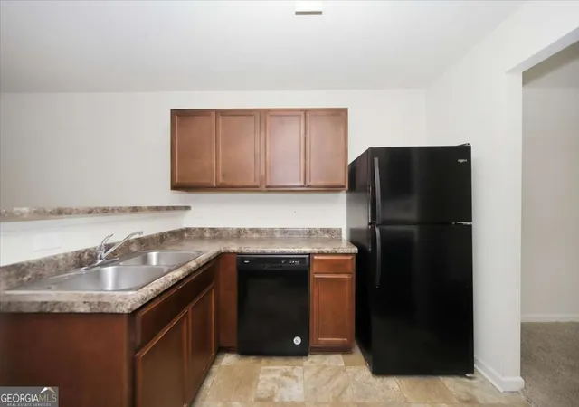 Photo 3 of Townhouse for sale at 2543 Piering Dr, Lithonia, GA 30038 | MLS# 10817734 | Listing updated on 2026-09-25