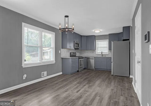 Photo 4 of Single family home for sale at 497 Dicks Ct Nw, Lilburn, GA 30047 | MLS# 10826676 | Listing updated on 2026-09-07