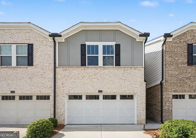 Photo 1 of Townhouse for sale at 1702 Villageside Ct, Lawrenceville, GA 30043 | MLS# 10823996 | Listing updated on 2026-09-17