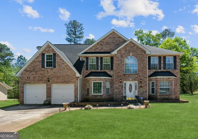 Single family home for sale at 3993 Smithfield Ln, Ellenwood, GA 30294 | MLS# 10854378