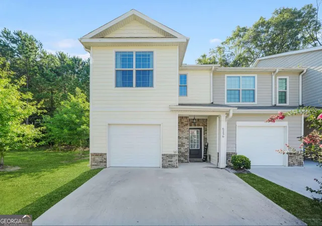 Photo 1 of Townhouse for sale at 6256 Trickle Bnd, Atlanta, GA 30349 | MLS# 10693700 | Listing updated on 2026-04-13