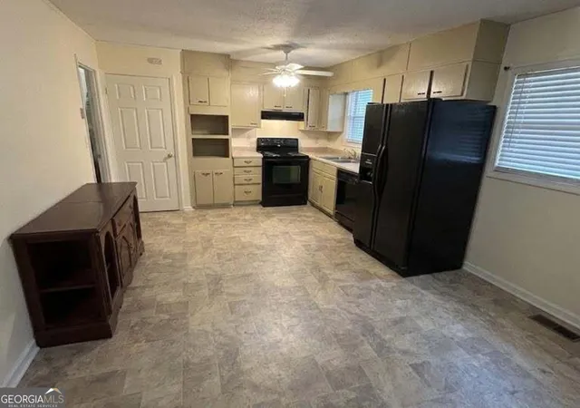 Photo 2 of Single family home for sale at 6052 Pinecreek Rd, Forest Park, GA 30297 | MLS# 10724431 | Listing updated on 2026-06-26