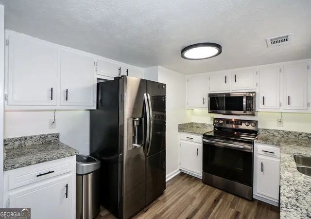 Photo 3 of Single family home for sale at 5059 Martins Xing Rd, Stone Mountain, GA 30088 | MLS# 10729646 | Listing updated on 2026-08-17