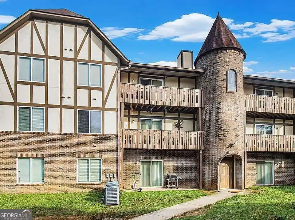 Listing Photo 1 - Condo for sale in 123 Camelot Dr located at 123 Camelot Dr, Atlanta, GA 30349 - Unit 123 Camelot Dr