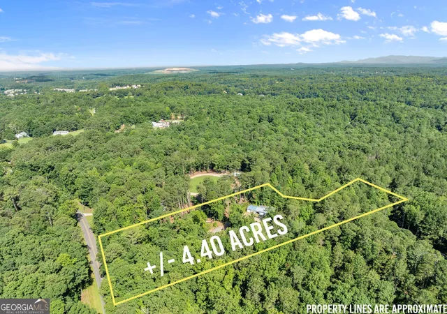 Photo 2 of Single family home for sale at 7095 Cogburn Rd, Cumming, GA 30028 | MLS# 10765277 | Listing updated on 2026-09-28