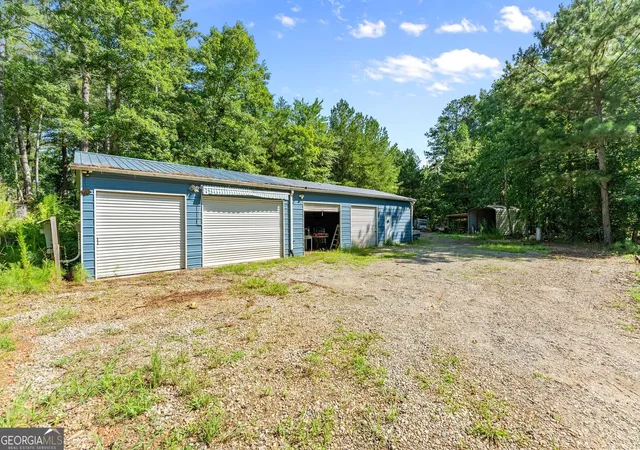 Photo 3 of Single family home for sale at 7095 Cogburn Rd, Cumming, GA 30028 | MLS# 10765277 | Listing updated on 2026-09-28