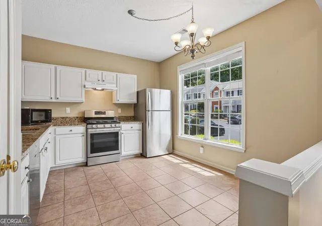 Photo 4 of Townhouse for sale at 1400 Kilmington Ct, Alpharetta, GA 30009 | MLS# 10792055 | Listing updated on 2026-09-17