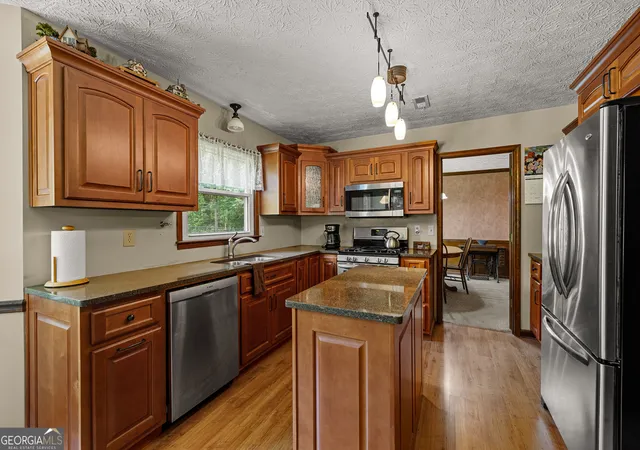 Photo 3 of Single family home for sale at 165 Woodsong Dr, Fayetteville, GA 30214 | MLS# 10825133 | Listing updated on 2026-09-10
