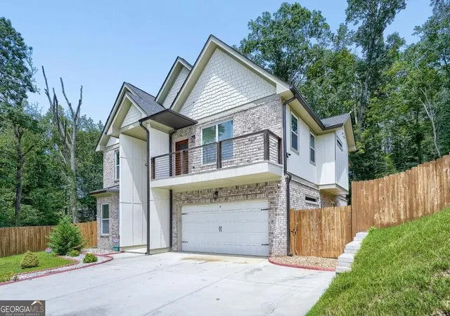 Photo 2 of Single family home for sale at 658 Rockbridge Rd Nw, Lilburn, GA 30047 | MLS# 10823571 | Listing updated on 2026-08-29