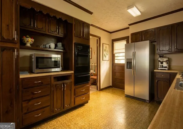 Photo 2 of Single family home for sale at 120 Morningside Dr, Newnan, GA 30263 | MLS# 10825899 | Listing updated on 2026-08-23