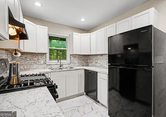 Photo 3 of Single family home for sale at 5633 Cypress Dr, Forest Park, GA 30297 | MLS# 10788860 | Listing updated on 2026-09-21