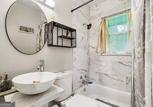Photo 4 of Single family home for sale at 5633 Cypress Dr, Forest Park, GA 30297 | MLS# 10788860 | Listing updated on 2026-09-21