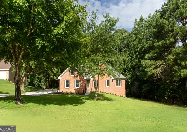 Photo 3 of Single family home for sale at 1055 Windridge Dr, Loganville, GA 30052 | MLS# 10803055 | Listing updated on 2026-09-10