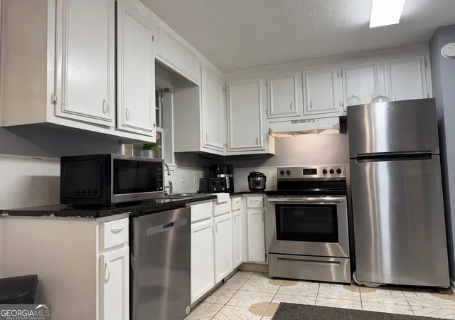 Photo 3 of Townhouse for sale at 1112 Windgate Cir Nw, Conyers, GA 30012 | MLS# 10781331 | Listing updated on 2026-08-17