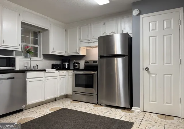 Photo 3 of Townhouse for sale at 1112 Windgate Cir NW, Conyers, GA 30012 | MLS# 10781331 | Listing updated on 2026-08-17