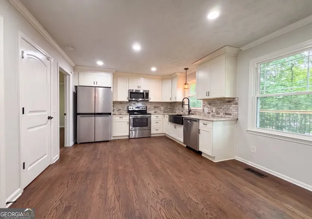 Photo 2 of Single family home for sale at 1394 Natchez Tr Sw, Marietta, GA 30008 | MLS# 10828333 | Listing updated on 2026-09-18