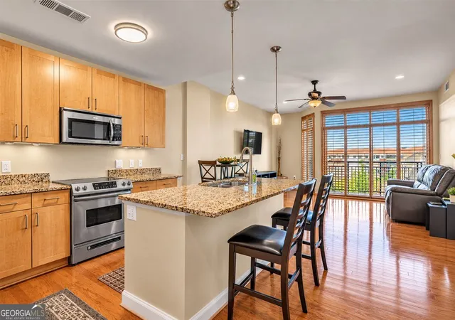 Photo 1 of Condo for sale at 711 Cosmopolitan Dr Ne #403, Atlanta, GA 30324 | MLS# 10834109 | Listing updated on 2026-09-10