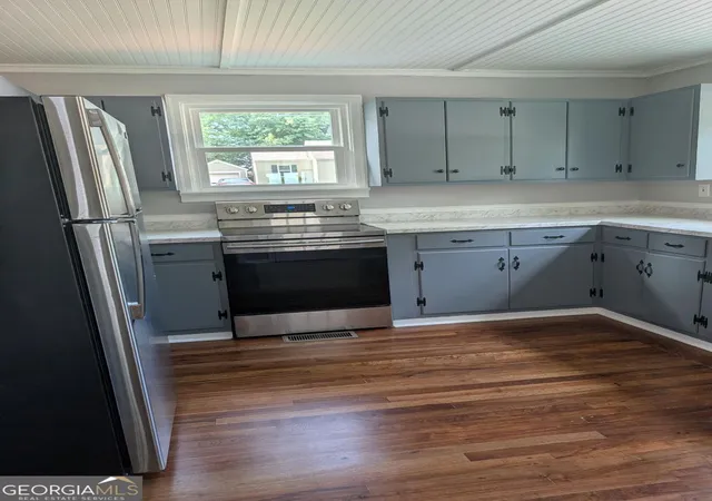 Photo 4 of Single family home for sale at 302 Pennsylvania Ave, Carrollton, GA 30117 | MLS# 10824943 | Listing updated on 2026-09-16