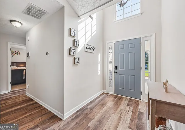 Photo 2 of Single family home for sale at 4672 Devencrest Ln, Buford, GA 30519 | MLS# 10834927 | Listing updated on 2026-09-11
