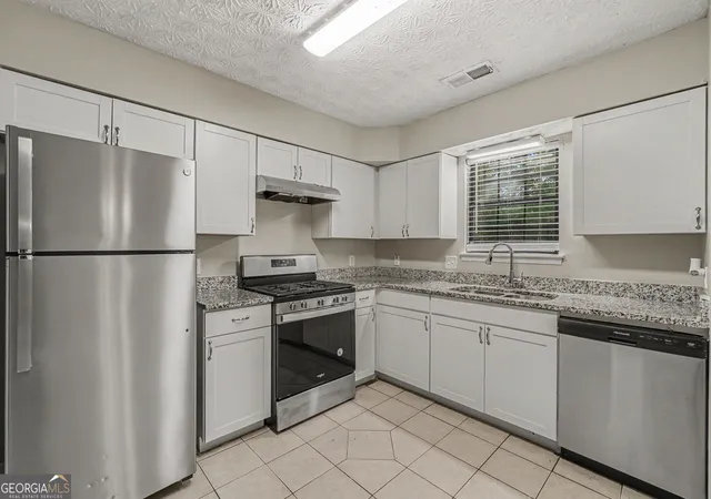 Photo 3 of Townhouse for sale at 3558 Hopkins Ct, Powder Springs, GA 30127 | MLS# 10834648 | Listing updated on 2026-09-10
