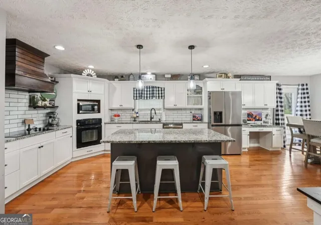Photo 3 of Single family home for sale at 6471 Forsyth Dr, Cumming, GA 30028 | MLS# 10830302 | Listing updated on 2026-09-04