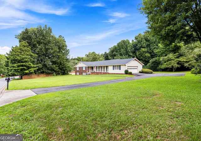 Photo 2 of Single family home for sale at 2405 Post Oak Tritt Rd, Marietta, GA 30062 | MLS# 10811209 | Listing updated on 2026-10-08