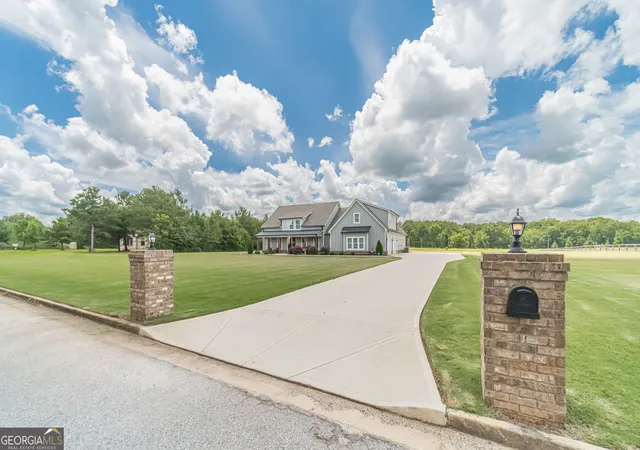 Photo 2 of Single family home for sale at 302 Savannah Dr, Mansfield, GA 30055 | MLS# 10823172 | Listing updated on 2026-09-22