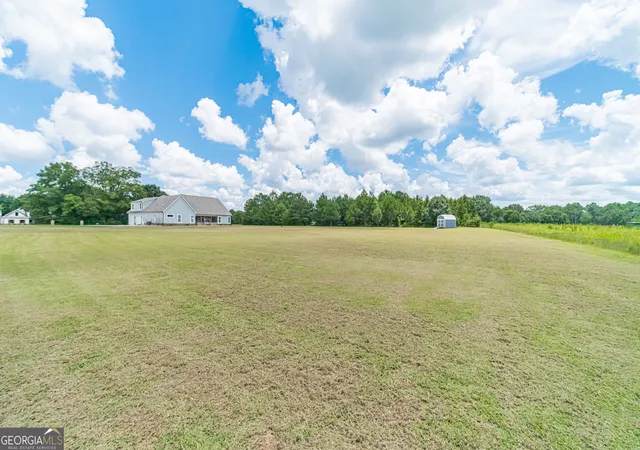 Photo 3 of Single family home for sale at 302 Savannah Dr, Mansfield, GA 30055 | MLS# 10823172 | Listing updated on 2026-09-22